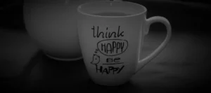 Cup with writing on about being happy